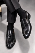 Alden deux ponpon matière cuir