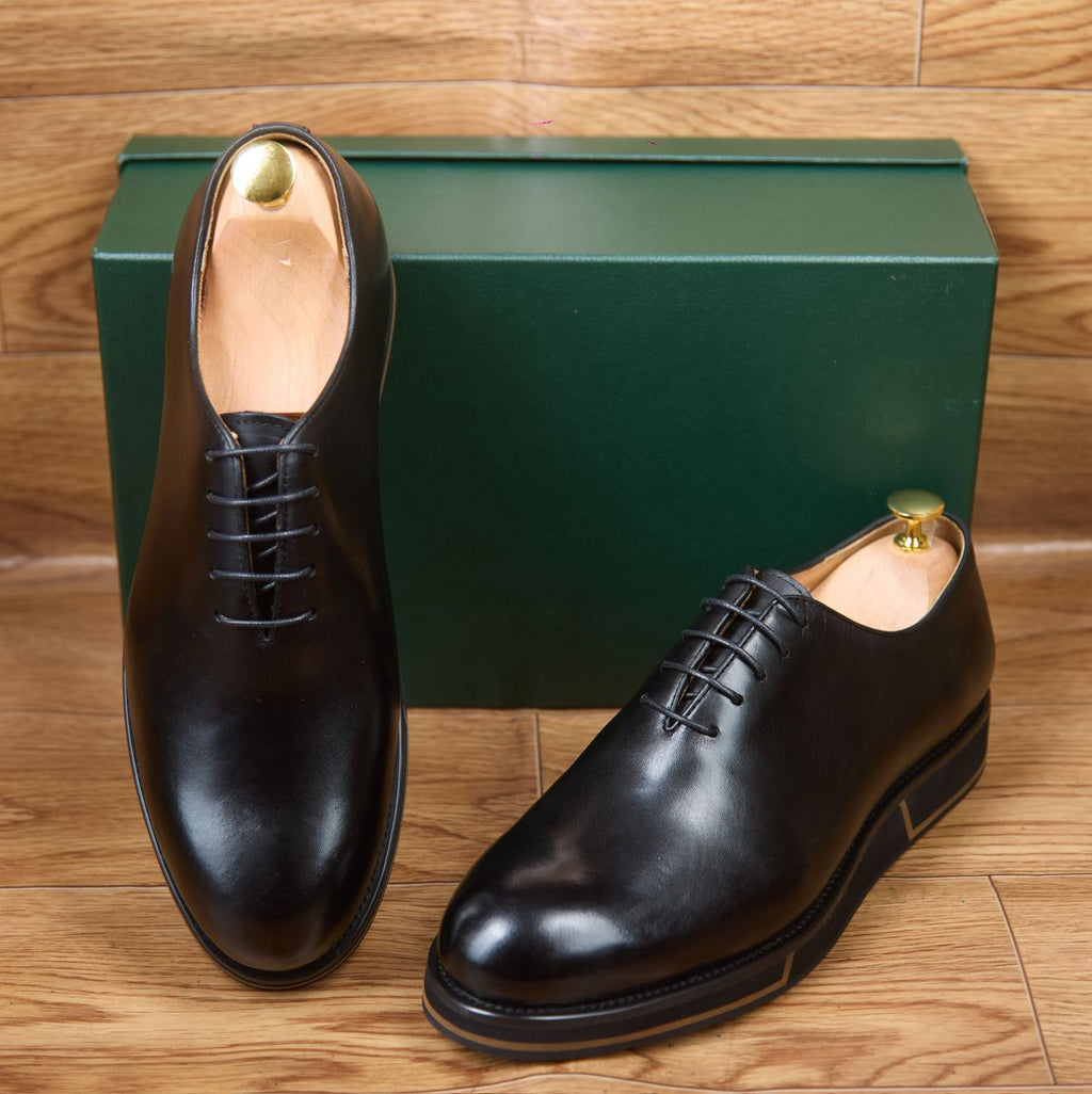 Soulier en cuir semelle gomme
