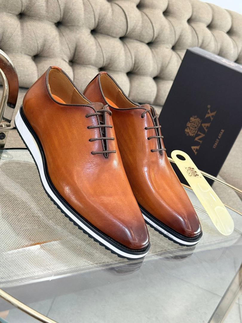 An@x matière cuir semelle gomme
