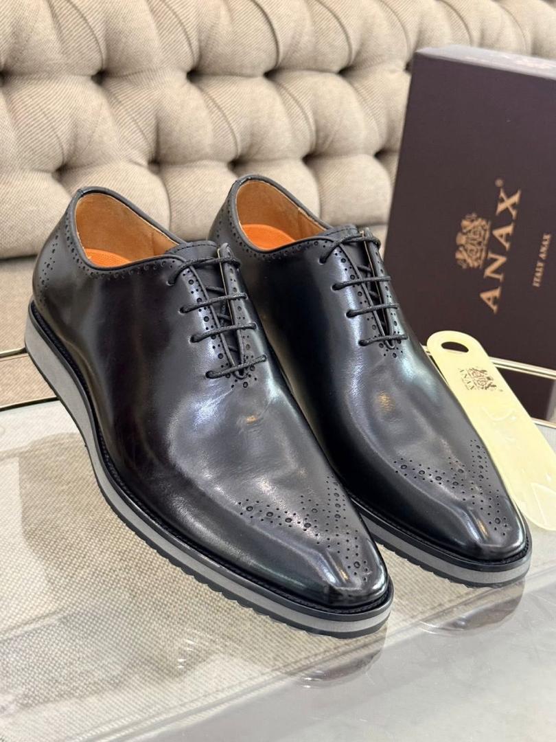 AN@X matière cuir semelle gomme
